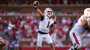 Auburn footballNov 11, 2023; Fayetteville, Arkansas, USA; Auburn Tigers quarterback Payton Thorne (1) throws a pass during the first quarter against the Arkansas Razorbacks at Donald W. Reynolds Razorback Stadium. Mandatory Credit: Brett Rojo-USA TODAY Sports