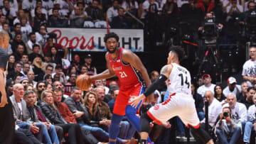 TORONTO, CANADA - MAY 12: Joel Embiid #21 of the Philadelphia 76ers handles the ball against Danny Green #14 of the Toronto Raptors during Game Seven of the Eastern Conference Semi-Finals of the 2019 NBA Playoffs on May 12, 2019 at the Scotiabank Arena in Toronto, Ontario, Canada. NOTE TO USER: User expressly acknowledges and agrees that, by downloading and or using this Photograph, user is consenting to the terms and conditions of the Getty Images License Agreement. Mandatory Copyright Notice: Copyright 2019 NBAE (Photo by Jesse D. Garrabrant/NBAE via Getty Images)