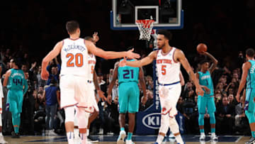 BROOKLYN, NY - NOVEMBER 7: Courtney Lee #5 high gives Doug McDermott #20 of the New York Knicks during the game against the Charlotte Hornets on November 7, 2017 at Madison Square Garden in New York City, New York. Copyright 2017 NBAE (Photo by Nathaniel S. Butler/NBAE via Getty Images)