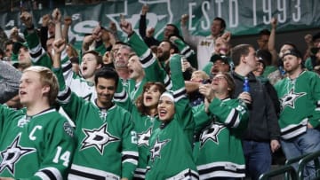 DALLAS, TX - FEBRUARY 24: Dallas Stars fans celebrate a win against the Arizona Coyotes at the American Airlines Center on February 24, 2017 in Dallas, Texas. (Photo by Glenn James/NHLI via Getty Images)