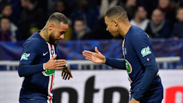 Paris Saint-Germain's French forward Kylian Mbappe (R) is congratulated by Paris Saint-Germain's Brazilian forward Neymar after scoring a goal during the French Cup semi-final football match between Olympique Lyonnais (OL) and Paris Saint-Germain (PSG) at the Groupama Stadium in Decines-Charpieu, centraleastern France, on March 4, 2020. (Photo by Philippe DESMAZES / AFP) (Photo by PHILIPPE DESMAZES/AFP via Getty Images)
