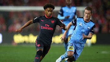 SYDNEY, AUSTRALIA - JULY 13: Reiss Nelson of Arsenal dribbles the ball during the match between Sydney FC and Arsenal FC at ANZ Stadium on July 13, 2017 in Sydney, Australia. (Photo by Cameron Spencer/Getty Images)