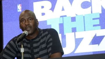 May 21, 2013; Charlotte, NC, USA; NBA team owner Michael Jordan announces that the Charlotte Bobcats will change their name and branding to the Charlotte Hornets starting in the 2014 2015 season at Time Warner Cable Arena. Mandatory Credit: Sam Sharpe-USA TODAY Sports