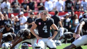 Oct 30, 2016; Tampa, FL, USA; Oakland Raiders quarterback Derek Carr (4) warms up before the start of a game against the Tampa Bay Buccaneers at Raymond James Stadium. Mandatory Credit: Jonathan Dyer-USA TODAY Sports