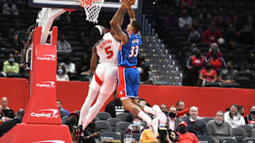 WASHINGTON, DC - NOVEMBER 03: Precious Achiuwa #5 of the Toronto Raptors blocks Kyle Kuzma #33 of the Washington Wizards shot in the first half during a NBA basketball game against the Toronto Raptors at Capital One Arena on November 3, 2020 in Washington, DC. NOTE TO USER: User expressly acknowledges and agrees that, by downloading and or using this photograph, User is consenting to the terms and conditions of the Getty Images License Agreement. (Photo by Mitchell Layton/Getty Images)