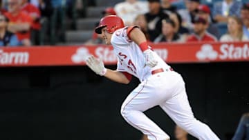 May 10, 2016; Anaheim, CA, USA; Los Angeles Angels center fielder Mike Trout (27) runs after hitting a single in the first inning against St. Louis Cardinals at Angel Stadium of Anaheim. Mandatory Credit: Gary A. Vasquez-USA TODAY Sports