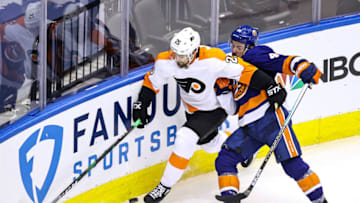 James van Riemsdyk, Philadelphia Flyers and Jean-Gabriel Pageau, New York Islanders (Photo by Elsa/Getty Images)