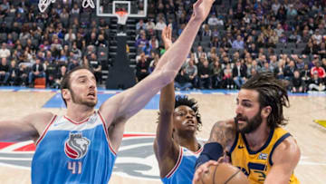 The Sacramento Kings' Kosta Koufos (41) and teammate De'Aaron Fox (5) defend against the Utah Jazz's Ricky Rubio (3) at the Golden 1 Center in Sacramento, Calif., on Saturday, March 3, 2018. (Hector Amezcua/Sacramento Bee/TNS via Getty Images)