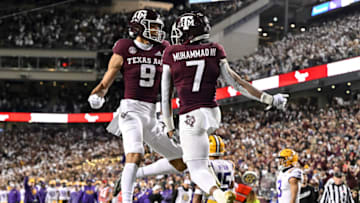 Nov 26, 2022; College Station, Texas, USA; Texas A&M Aggies wide receiver Moose Muhammad III (7) celebrates with wide receiver Noah Thomas (9) after scoring a touchdown against the LSU Tigers during the fourth quarter at Kyle Field. Mandatory Credit: Maria Lysaker-USA TODAY Sports