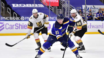 Apr 7, 2021; St. Louis, Missouri, USA; St. Louis Blues center Tyler Bozak (21) handles the puck during the second period against the Vegas Golden Knights at Enterprise Center. Mandatory Credit: Jeff Curry-USA TODAY Sports