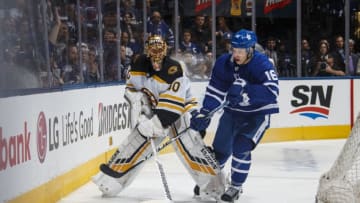 TORONTO, ON - APRIL 21: Tuukka Rask #40 of the Boston Bruins plays the puck against Mitch Marner #16 of the Toronto Maple Leafs during the third period during Game Six of the Eastern Conference First Round during the 2019 NHL Stanley Cup Playoffs at the Scotiabank Arena on April 21, 2019 in Toronto, Ontario, Canada. (Photo by Mark Blinch/NHLI via Getty Images)