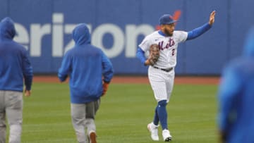 NEW YORK, NEW YORK - APRIL 11: Dominic Smith #2 of the New York Mets waves to fans after a rain delay is called during the first inning against the Miami Marlins at Citi Field on April 11, 2021 in the Queens borough of New York City. (Photo by Sarah Stier/Getty Images)