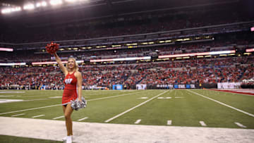 INDIANAPOLIS, IN - DECEMBER 02: A Wisconsin Badgers cheerleader performs during the first quarter against the Ohio State Buckeyes during the Big Ten Championship game at Lucas Oil Stadium on December 2, 2017 in Indianapolis, Indiana. (Photo by Andy Lyons/Getty Images)
