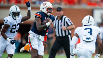 Auburn football quarterback T.J. Finley (1) carries the ball as the Auburn Tigers take on the Penn State Nittany Lions at Jordan-Hare Stadium in Auburn, Ala., on Saturday, Sept. 17, 2022.Aupsu23