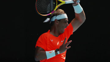 MELBOURNE, AUSTRALIA - FEBRUARY 15: Rafael Nadal of Spain plays a forehand in his Men's Singles fourth round match against Fabio Fognini of Italy during day eight of the 2021 Australian Open at Melbourne Park on February 15, 2021 in Melbourne, Australia. (Photo by Mark Metcalfe/Getty Images)