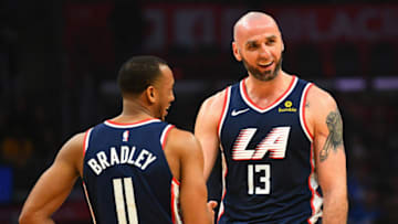LOS ANGELES, CA - DECEMBER 22: Los Angeles Clippers Center Marcin Gortat (13) talks with Los Angeles Clippers Guard Avery Bradley (11) during a NBA game between the Denver Nuggets and the Los Angeles Clippers on December 22, 2018 at STAPLES Center in Los Angeles, CA. (Photo by Brian Rothmuller/Icon Sportswire via Getty Images)
