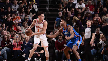 PHOENIX, AZ - MARCH 2: Devin Booker #1 of the Phoenix Suns handles the ball against Josh Huestis #34 of the Oklahoma City Thunder on March 2, 2018 at Talking Stick Resort Arena in Phoenix, Arizona. NOTE TO USER: User expressly acknowledges and agrees that, by downloading and or using this photograph, user is consenting to the terms and conditions of the Getty Images License Agreement. Mandatory Copyright Notice: Copyright 2018 NBAE (Photo by Michael Gonzales/NBAE via Getty Images)