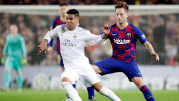 BARCELONA, SPAIN - DECEMBER 18: (L-R) Casemiro of Real Madrid, Ivan Rakitic of FC Barcelona during the La Liga Santander match between FC Barcelona v Real Madrid at the Camp Nou on December 18, 2019 in Barcelona Spain (Photo by David S. Bustamante/Soccrates/Getty Images)