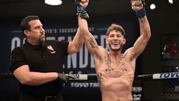 LAS VEGAS, NV - AUGUST 22: Mike Santiago celebrates after his knockout victory over Mark Cherico in their featherweight bout during Dana White's Tuesday Night Contender Series at the TUF Gym on August 22, 2017 in Las Vegas, Nevada. (Photo by Brandon Magnus/DWTNCS)