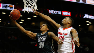 NEW YORK, NY - MARCH 15: Dyshawn Pierre #21 of the Dayton Flyers defends against Treveon Graham #21 of the Virginia Commonwealth Rams during the Atlantic 10 Basketball Tournament - Championship game at Barclays Center on March 15, 2015 in New York, New York. Virginia Commonwealth Rams defeated Dayton Flyers 71-65. (Photo by Mike Stobe/Getty Images)