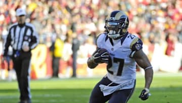 Dec 7, 2014; Landover, MD, USA; St. Louis Rams running back Tre Mason (27) rushes the ball against the Washington Redskins during the first half at FedEx Field. Mandatory Credit: Brad Mills-USA TODAY Sports