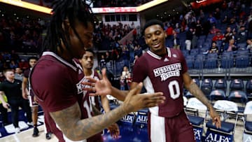 Feb 18, 2023; Oxford, Mississippi, USA; Mississippi State Bulldogs forward D.J. Jeffries (0) reacts with forward Tyler Stevenson (14) after defeating the Mississippi Rebels at The Sandy and John Black Pavilion at Ole Miss. Mandatory Credit: Petre Thomas-USA TODAY Sports