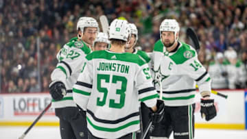 Dec 29, 2022; Saint Paul, Minnesota, USA; Dallas Stars center Wyatt Johnston (53) is congratulated by teammates including left wing Mason Marchment (27) and left wing Jamie Benn (14) after scoring against Minnesota Wild in the third period at Xcel Energy Center. Mandatory Credit: Matt Blewett-USA TODAY Sports