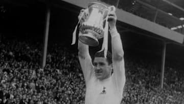 20th May 1967: Dave Mackay, the captain of Tottenham Hotspur, celebrating with his teammates (left to right) Jimmy Greaves, Alan Gilzean, Pat Jennings, Terry Venables and Jimmy Robertson, after winning the FA Cup. (Photo by Douglas Miller/Keystone/Getty Images)