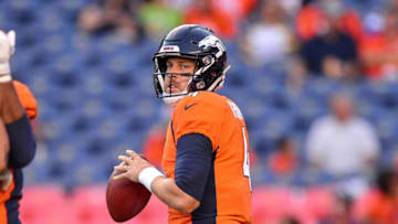 DENVER, CO - AUGUST 11: Quarterback Case Keenum #4 of the Denver Broncos sets to pass as he warms up before an NFL preseason game against the Minnesota Vikings at Broncos Stadium at Mile High on August 11, 2018 in Denver, Colorado. (Photo by Dustin Bradford/Getty Images)