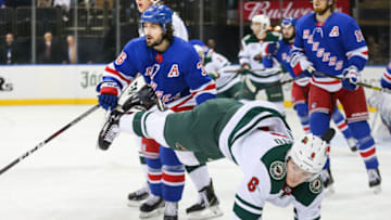 NEW YORK, NY - FEBRUARY 21: New York Rangers Right Wing Mats Zuccarello (36) trips up Minnesota Wild Winger Ryan Donato (6) during the National Hockey League game between the Minnesota Wild and the New York Rangers on February 21, 2019 at Madison Square Garden in New York, NY. (Photo by Joshua Sarner/Icon Sportswire via Getty Images)