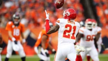 Nov 15, 2015; Denver, CO, USA; Kansas City Chiefs cornerback Sean Smith (21) intercepts a pass thrown by Denver Broncos quarterback Peyton Manning (18) during the first half at Sports Authority Field at Mile High. Mandatory Credit: Chris Humphreys-USA TODAY Sports