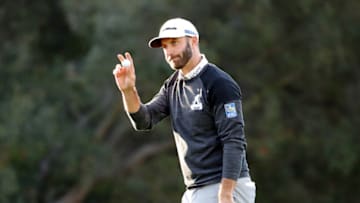PACIFIC PALISADES, CALIFORNIA - FEBRUARY 13: Dustin Johnson of the United States acknowledges fans on the 12th green during the first round of the Genesis Invitational on February 13, 2020 in Pacific Palisades, California. (Photo by Katelyn Mulcahy/Getty Images)