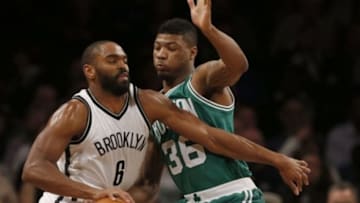 Mar 23, 2015; Brooklyn, NY, USA; Boston Celtics guard Marcus Smart (36) defends against Brooklyn Nets guard Alan Anderson (6) during second half at Barclays Center. Boston Celtics won 110-91. Mandatory Credit: Noah K. Murray-USA TODAY Sports