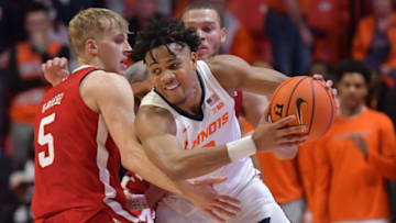 Jan 31, 2023; Champaign, Illinois, USA; Nebraska Cornhuskers guard Sam Griesel (5) pressures Illinois Fighting Illini guard Terrence Shannon Jr. (0) during the second half at State Farm Center. Mandatory Credit: Ron Johnson-USA TODAY Sports