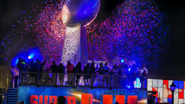 ATLANTA, GA - JANUARY 31: Confetti and fans surround the Lombardi Trophy replica at Super Bowl Live in Atlanta ahead of the coming weekend's Super Bowl LIII between the New England Patriots and the Los Angeles Rams on Jan. 31, 2019. (Photo by Stan Grossfeld/The Boston Globe via Getty Images)
