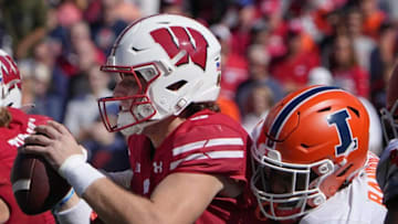 Wisconsin quarterback Graham Mertz (5) is sacked by Illinois defensive lineman Keith Randolph Jr. (88) during the fourth quarter of their game Saturday, October 1, 2022 at Camp Randall Stadium in Madison, Wis. Illinois beat Wisconsin 34-10.MARK HOFFMAN/MILWAUKEE JOURNAL SENTINELMjs Uwgrid01 13 Jpg Uwgrid01