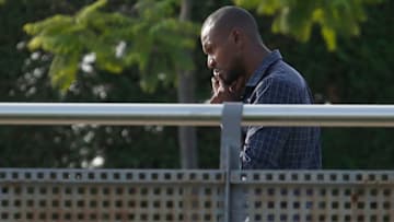 Barcelona's French technical secretary Eric Abidal uses his mobile as he arrives to attend a training session at the FC Barcelona's Joan Gamper Sports Center in Sant Joan Despi, on August 24, 2018 (Photo by PAU BARRENA / AFP) (Photo credit should read PAU BARRENA/AFP/Getty Images)