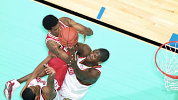 Apr 1, 2002; Atlanta, GA, USA; FILE PHOTO; Maryland Terrapins center Tahj Holden (45) and Drew Nicholas (12) defend Indiana Hoosiers center Jeff Newton (50) in the Championship game of the 2002 NCAA Men's Basketball Tournament at the Georgia Dome. Maryland defeated Indiana 64-52. Mandatory Credit: USA TODAY Sports
