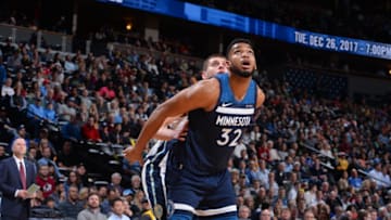 DENVER, CO - DECEMBER 20: Karl-Anthony Towns #32 of the Minnesota Timberwolves plays defense against the Denver Nuggets on December 20, 2017 at the Pepsi Center in Denver, Colorado. NOTE TO USER: User expressly acknowledges and agrees that, by downloading and/or using this Photograph, user is consenting to the terms and conditions of the Getty Images License Agreement. Mandatory Copyright Notice: Copyright 2017 NBAE (Photo by Bart Young/NBAE via Getty Images)