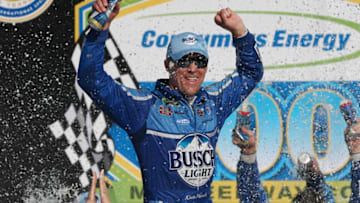 BROOKLYN, MI - AUGUST 12: Kevin Harvick, driver of the #4 Busch Light/Mobil 1 Ford, celebrates in Victory Lane after winning the Monster Energy NASCAR Cup Series Consmers Energy 400 at Michigan International Speedway on August 12, 2018 in Brooklyn, Michigan. (Photo by Sarah Crabill/Getty Images)