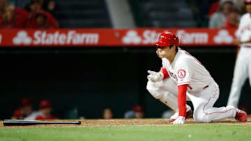 ANAHEIM, CALIFORNIA - MAY 20: Shohei Ohtani #17 of the Los Angeles Angels of Anaheim reacts to injuring his hand as he strikes out during the eighth inning of a game against the Minnesota Twins at Angel Stadium of Anaheim on May 20, 2019 in Anaheim, California. (Photo by Sean M. Haffey/Getty Images)