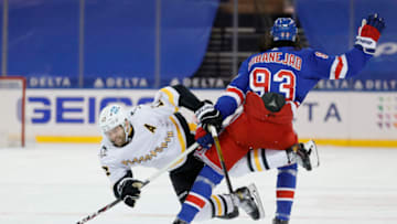 Feb 1, 2021; New York, New York, USA; Bryan Rust #17 of the Pittsburgh Penguins trips over Mika Zibanejad #93 of the New York Rangers during the third period at Madison Square Garden on February 01, 2021 in New York City. The Rangers won 3-1. Mandatory Credit: Sarah Stier/POOL PHOTOS-USA TODAY Sports