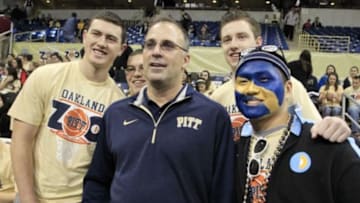 Jan 10, 2015; Pittsburgh, PA, USA; Pittsburgh Panthers head football coach Pat Narduzzi (front left) poses for a photo with members of the Panthers student section before the game against the Clemson Tigers at the Petersen Events Center. Mandatory Credit: Charles LeClaire-USA TODAY Sports