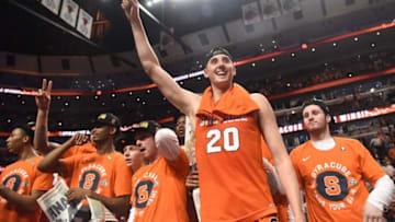 Mar 27, 2016; Chicago, IL, USA; Syracuse Orange forward Tyler Lydon (20) celebrates with teammates after defeating the Virginia Cavaliers in the championship game of the midwest regional of the NCAA Tournament at United Center. Mandatory Credit: David Banks-USA TODAY Sports