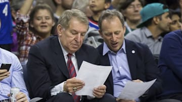 Dec 7, 2015; Philadelphia, PA, USA; Philadelphia 76ers special advisor Jerry Colangelo (L) goes over first quarter stats with owner Joshua Harris (R) during a timeout against the San Antonio Spurs at Wells Fargo Center. The Spurs won 119-68. Mandatory Credit: Bill Streicher-USA TODAY Sports