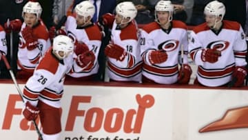 Jan 6, 2016; Vancouver, British Columbia, CAN; Carolina Hurricanes defenseman John-Michael Liles (26) celebrates his goal against Vancouver Canucks goaltender Jacob Markstrom (25) (not pictured) during the second period at Rogers Arena. Mandatory Credit: Anne-Marie Sorvin-USA TODAY Sports