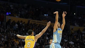Oct 7, 2016; Los Angeles, CA, USA; Denver Nuggets guard Jamal Murray (27) shoots against Los Angeles Lakers guard Jordan Clarkson (6) during the second half at Staples Center. Mandatory Credit: Richard Mackson-USA TODAY Sports