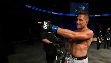 JACKSONVILLE, FLORIDA - MAY 13: Drew Dober (R) of the United States celebrates after defeating Alexander Hernandez of the United States in their Lightweight bout during UFC Fight Night at VyStar Veterans Memorial Arena on May 13, 2020 in Jacksonville, Florida. (Photo by Douglas P. DeFelice/Getty Images)