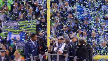 Feb 2, 2014; East Rutherford, NJ, USA; Seattle Seahawks quarterback Russell Wilson (3) with the Vince Lombardi Trophy after Super Bowl XLVIII against the Denver Broncos at MetLife Stadium. Seattle Seahawks won 43-8. Mandatory Credit: Jim O