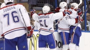 Apr 18, 2014; Tampa, FL, USA; Montreal Canadiens left wing Rene Bourque (17) celebrates with teammates after scoring a goal against the Tampa Bay Lightning during the second period in game two of the first round of the 2014 Stanley Cup Playoffs at Tampa Bay Times Forum. Mandatory Credit: Kim Klement-USA TODAY Sports